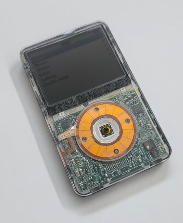 Custom iPod Video 5.5 Gen flash modded – clear transparent faceplate showing internals